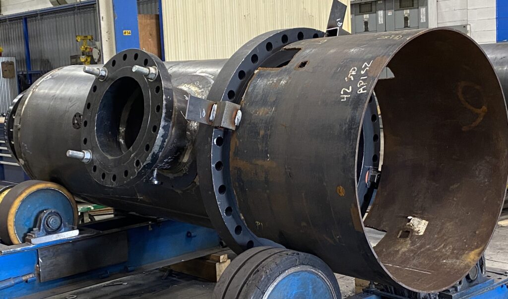 IMG_0768 Carbon steel pressure vessel with flanged connections on shop rollers at Alps Welding.