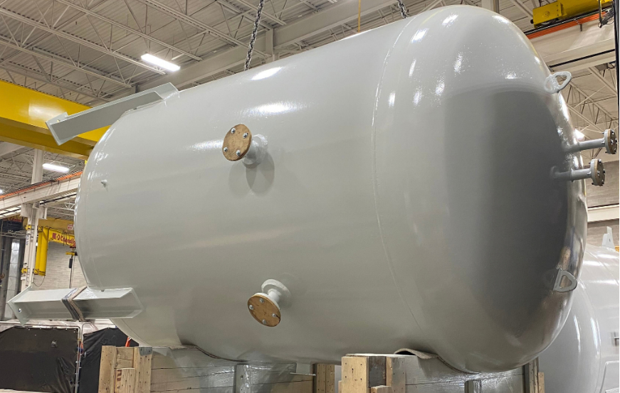 Untitled design Painted carbon steel buffer vessel with capped nozzle connections at Alps Welding
