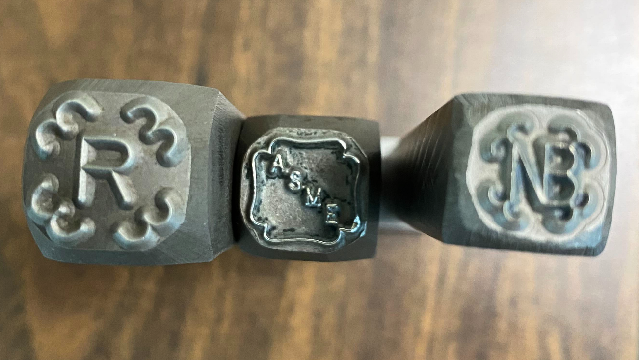 stamps Metal stamping tools bearing NB, ASME and R symbols at Alps Welding.